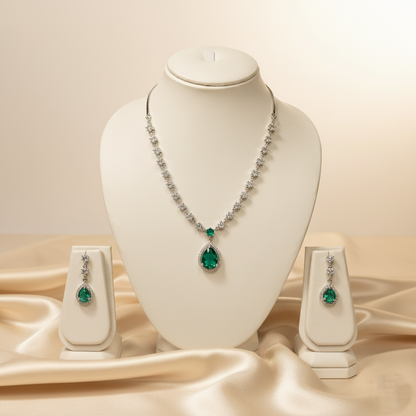 Jewelry set with necklace and earrings on a mannequin bust against a beige background
