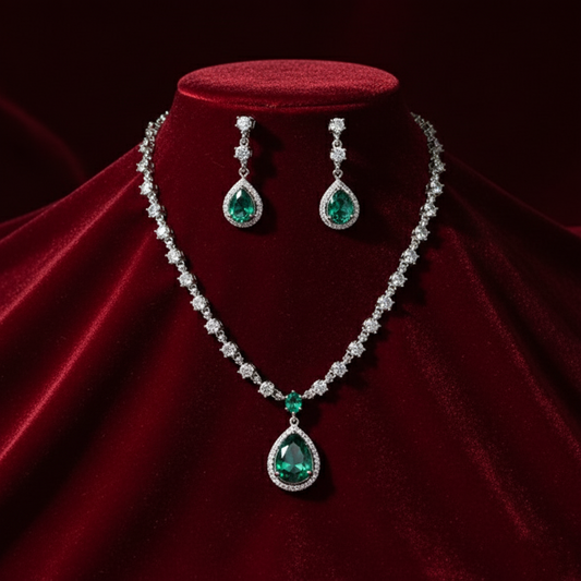 Jewelry set with necklace and earrings on a red velvet background