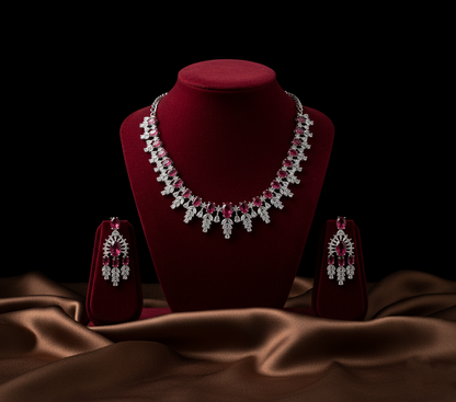Jewelry set with necklace and earrings on a red velvet stand against a dark background