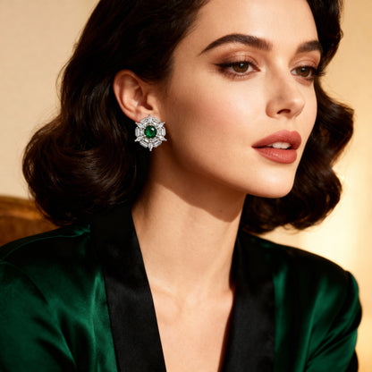 Woman wearing a green emerald earring with a soft background